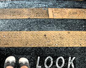 look (at those shoes) before crossing