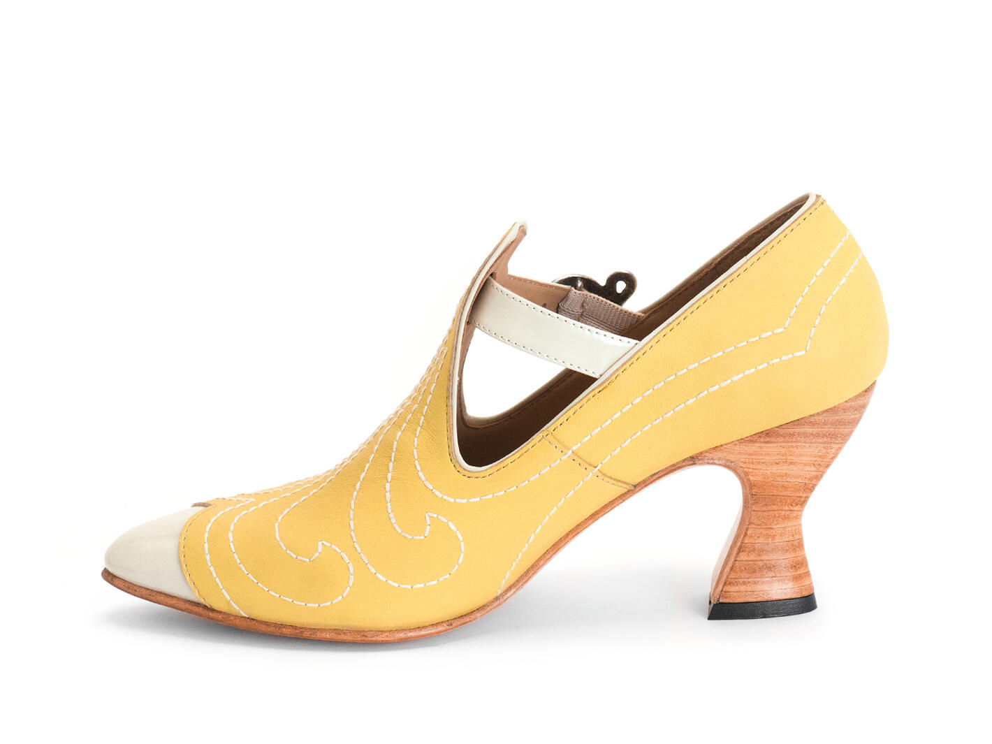 Somani Yellow T-strap heel with stitching: Profile inside