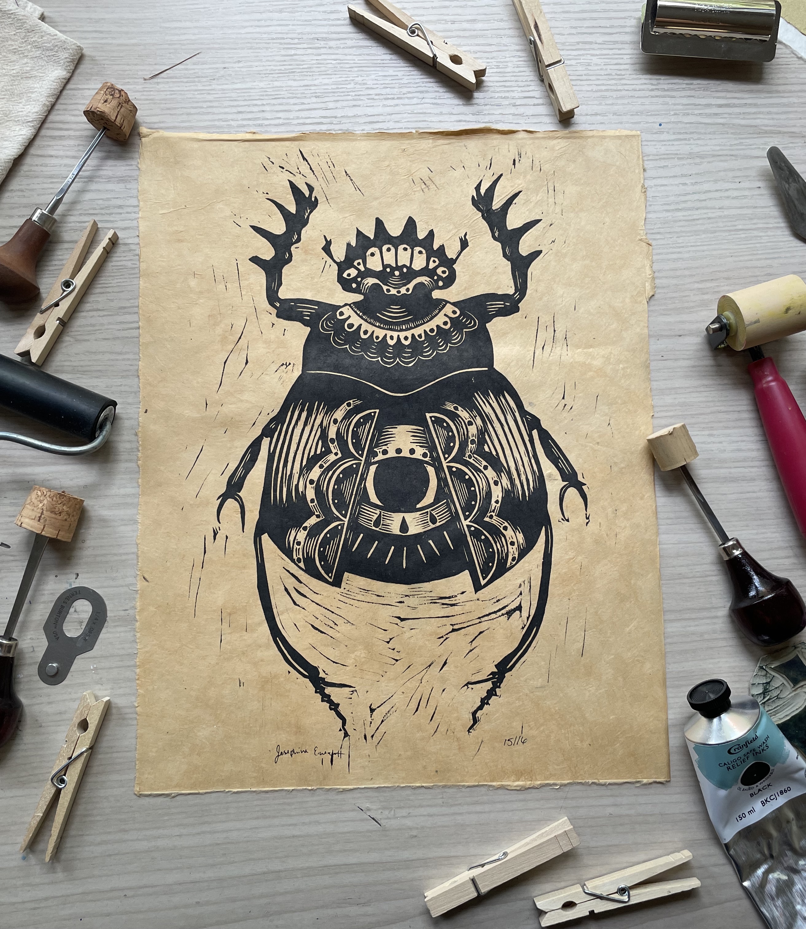 Linocut art print of a scarab by Rosie Josie Studio.